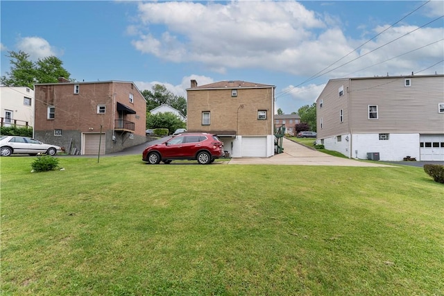 922 Bower Hill Rd, Mt Lebanon, PA 15243 - view of parking / parking lot with an attached garage, concrete driveway, and a residential view