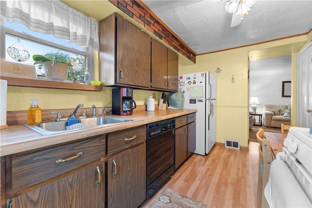 922 Bower Hill Rd, Mt Lebanon, PA 15243 - kitchen featuring white appliances, light wood-style floors, light countertops, a ceiling fan, and open floor plan