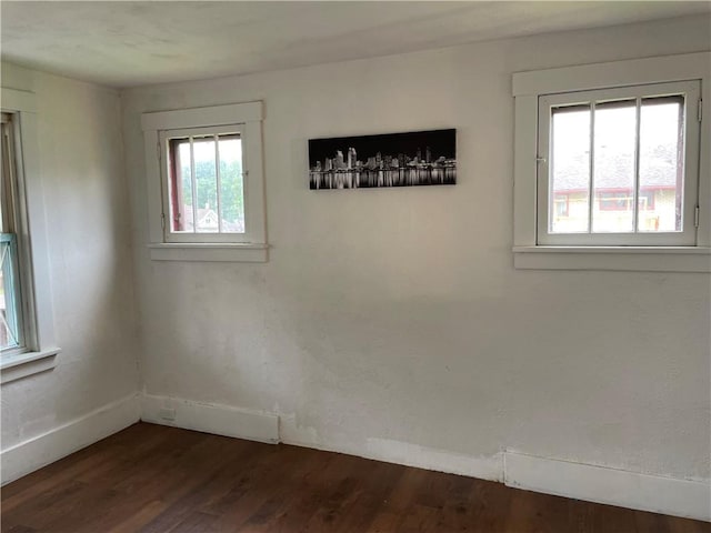 309 Delaware N, Versailles, PA 15137 - unfurnished room with dark wood-type flooring and baseboards