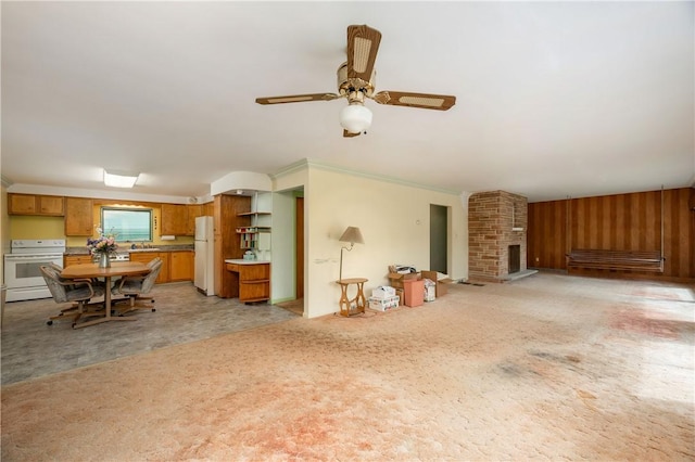 541 W Danville Rd, Oakland Twp, PA 16025 - living room featuring crown molding, a ceiling fan, light carpet, and a brick fireplace