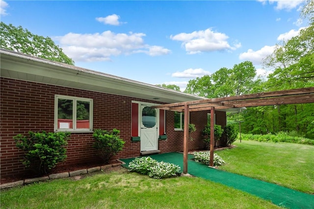 541 W Danville Rd, Oakland Twp, PA 16025 - view of front of house with brick siding, a front lawn, and a pergola