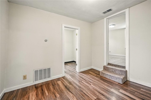 256 Marshall St, Hermitage, PA 16148 - empty room featuring baseboards, wood finished floors, and stairway