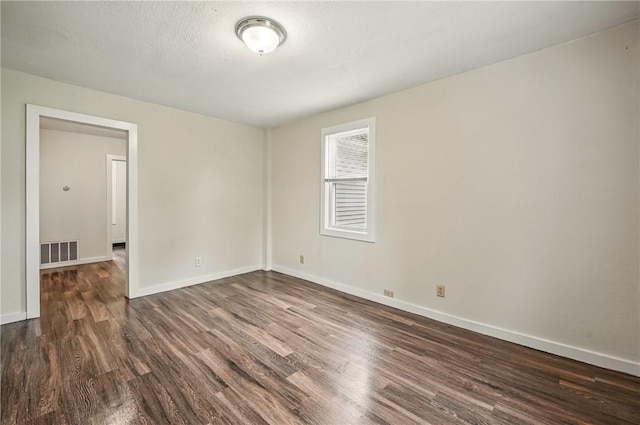 256 Marshall St, Hermitage, PA 16148 - unfurnished room with dark wood-type flooring and baseboards