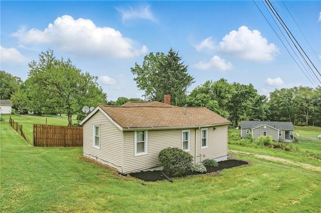 256 Marshall St, Hermitage, PA 16148 - back of property with a chimney and roof with shingles