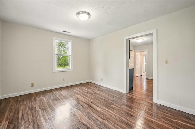256 Marshall St, Hermitage, PA 16148 - unfurnished room with dark wood-style floors and baseboards
