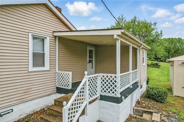 256 Marshall St, Hermitage, PA 16148 - doorway to property with a porch and a chimney