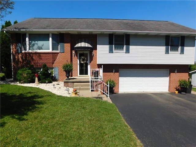 403 Shannon Dr, South Union Twp, PA 15401 - bi-level home featuring an attached garage, asphalt driveway, a front lawn, and brick siding