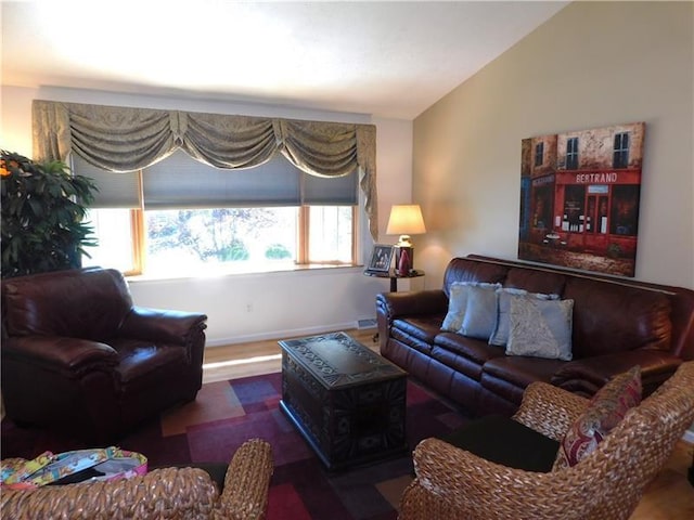403 Shannon Dr, South Union Twp, PA 15401 - living area featuring vaulted ceiling, wood finished floors, and baseboards