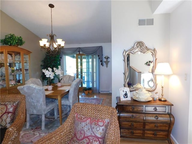 403 Shannon Dr, South Union Twp, PA 15401 - dining room with a chandelier, baseboards, and wood finished floors