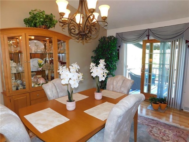 403 Shannon Dr, South Union Twp, PA 15401 - dining room featuring a chandelier and wood finished floors