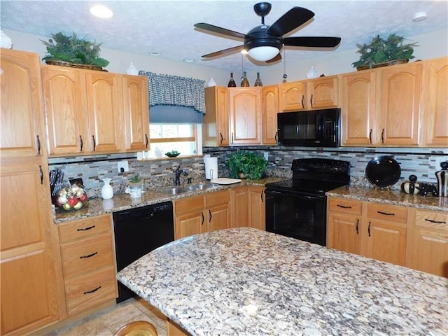 403 Shannon Dr, South Union Twp, PA 15401 - kitchen with black appliances, a sink, light stone counters, decorative backsplash, and ceiling fan
