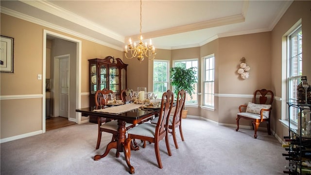 104 Cherokee Ct, Buffalo Twp But, PA 16229 - dining room featuring a chandelier, healthy amount of natural light, light carpet, crown molding, and baseboards