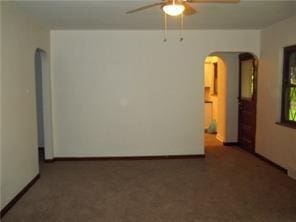 1545 Cooper Ave, Brighton Heights, PA 15212 - empty room featuring a ceiling fan and arched walkways