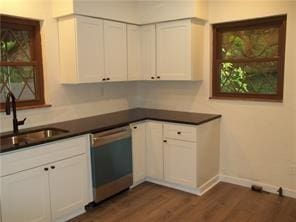 1545 Cooper Ave, Brighton Heights, PA 15212 - kitchen with dishwasher, a sink, dark countertops, dark wood finished floors, and white cabinetry