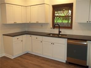 1545 Cooper Ave, Brighton Heights, PA 15212 - kitchen with dishwasher, a sink, dark countertops, and dark wood-type flooring