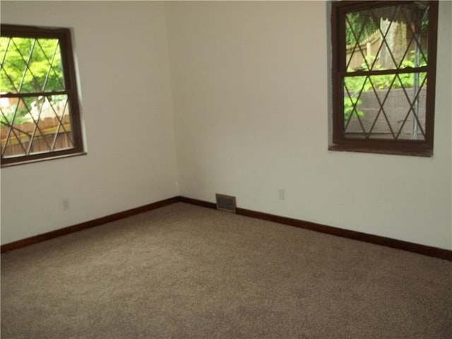 1545 Cooper Ave, Brighton Heights, PA 15212 - spare room featuring carpet flooring and baseboards