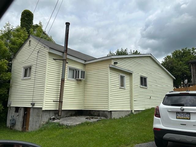 735 Park Ave, Johnstown, PA 15902 - view of home's exterior featuring a yard