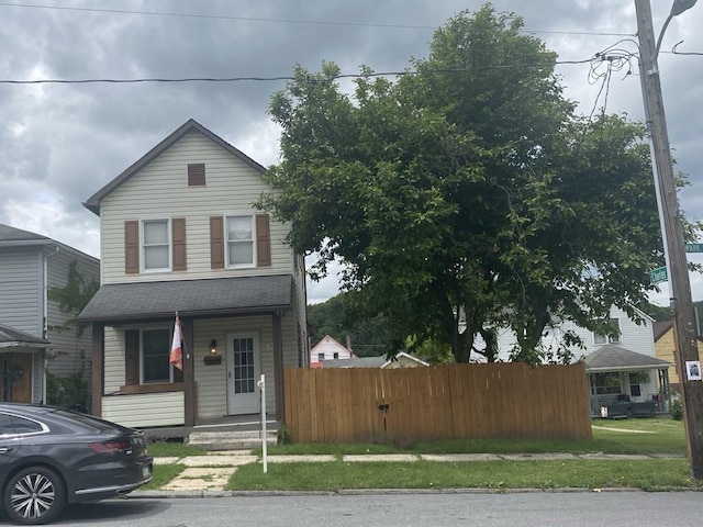 735 Park Ave, Johnstown, PA 15902 - view of front facade featuring a shingled roof and a porch
