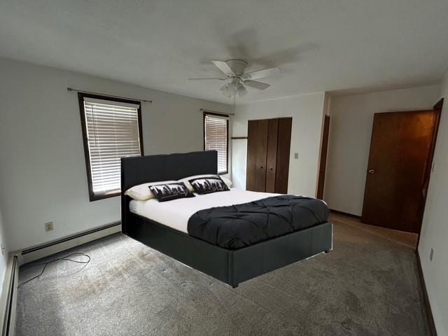 735 Park Ave, Johnstown, PA 15902 - carpeted bedroom featuring a baseboard heating unit and ceiling fan