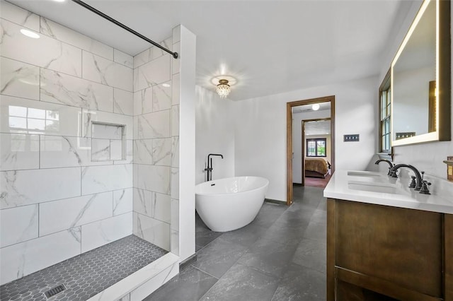 2465 Citation Ct, Franklin Park, PA 15090 - full bath featuring a freestanding tub, double vanity, a tile shower, connected bathroom, and baseboards