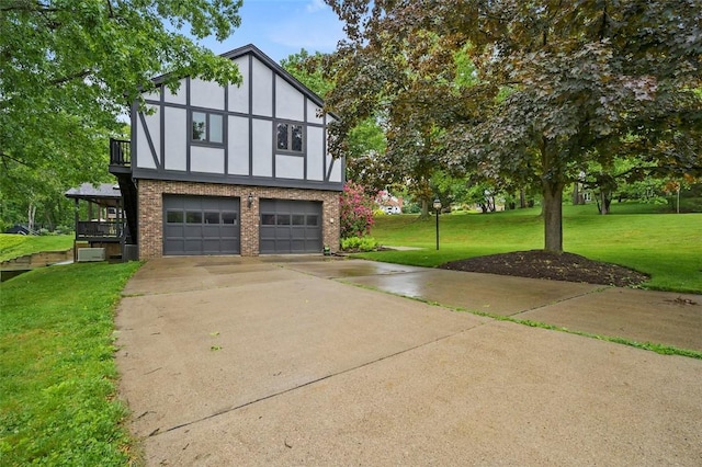 2465 Citation Ct, Franklin Park, PA 15090 - view of front of home featuring brick siding, an attached garage, driveway, a front yard, and stucco siding