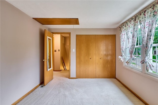 18 Giant Oak, Baden, PA 15005 - unfurnished bedroom with attic access, light colored carpet, a closet, baseboards, and multiple windows