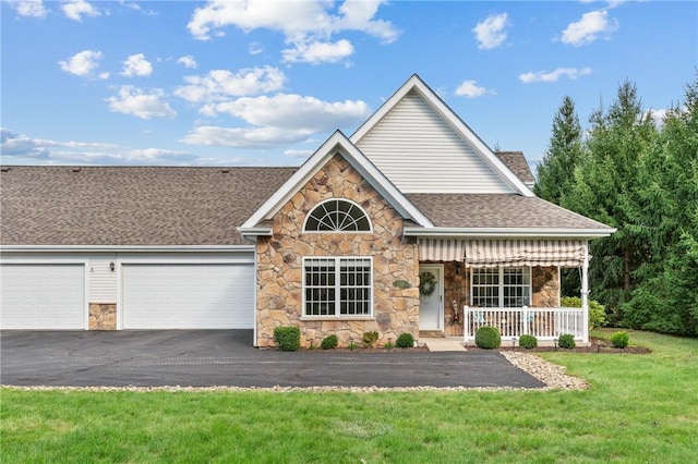139 Canter Ln, West Deer, PA 15044 - view of front facade with stone siding, covered porch, a shingled roof, asphalt driveway, and a front yard