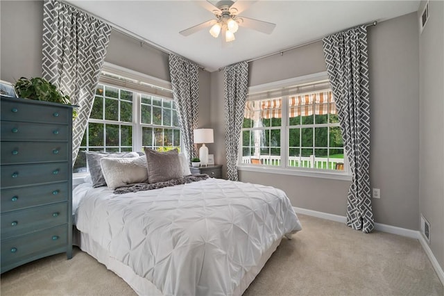 139 Canter Ln, West Deer, PA 15044 - bedroom featuring carpet flooring, multiple windows, baseboards, and a ceiling fan