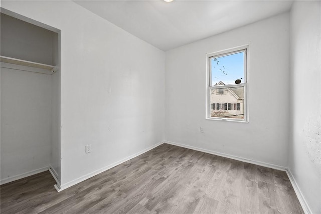 224 Moye Pl, Mount Oliver, PA 15210 - unfurnished bedroom with wood finished floors and baseboards