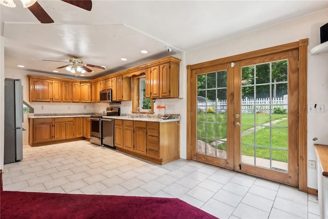 1303 Isabella Rd, Connellsville, PA 15425 - kitchen featuring appliances with stainless steel finishes, a ceiling fan, light countertops, french doors, and recessed lighting