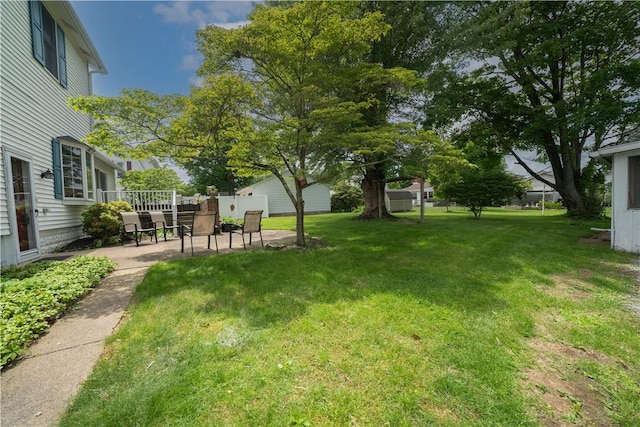 115 Orchard Ave, Rostraver, PA 15012 - view of grassy yard with a patio