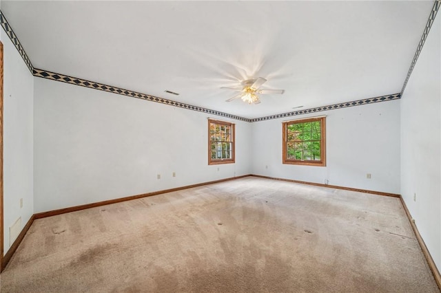 1001 Grand Ave, Hopewell Twp Bea, PA 15001 - carpeted empty room with baseboards and a ceiling fan