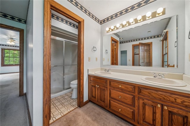 1001 Grand Ave, Hopewell Twp Bea, PA 15001 - full bathroom featuring double vanity, a shower stall, toilet, and baseboards