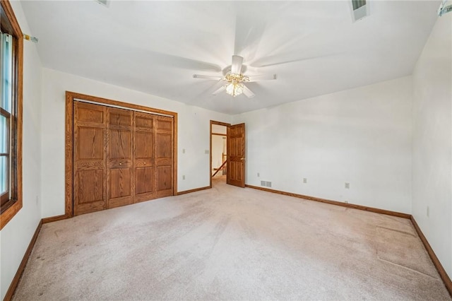 1001 Grand Ave, Hopewell Twp Bea, PA 15001 - unfurnished bedroom featuring light colored carpet, baseboards, a closet, and ceiling fan