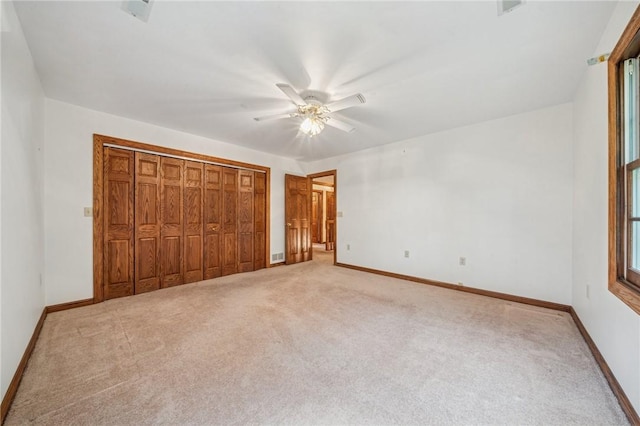 1001 Grand Ave, Hopewell Twp Bea, PA 15001 - unfurnished bedroom featuring light colored carpet, baseboards, a closet, and a ceiling fan