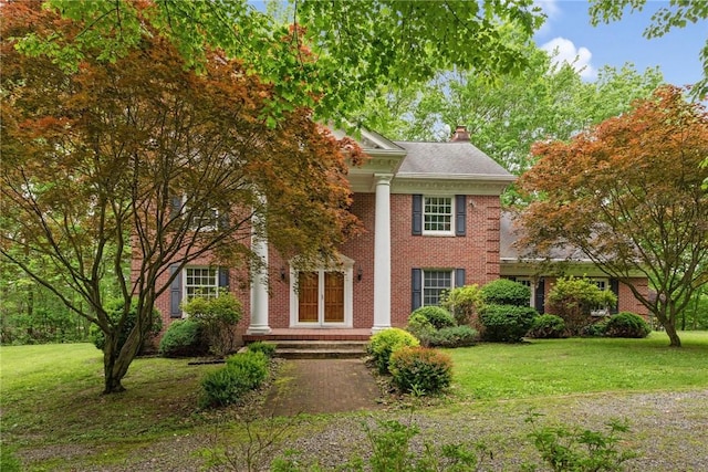 1001 Grand Ave, Hopewell Twp Bea, PA 15001 - neoclassical / greek revival house featuring a chimney, a front yard, and brick siding