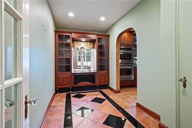6820 Edgerton, Point Breeze, PA 15208 - hall featuring arched walkways, baseboards, and recessed lighting