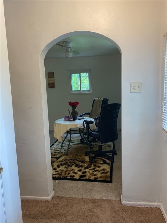 7740 Pershing St, Penn Hills, PA 15235 - office area with carpet floors, arched walkways, ceiling fan, and baseboards