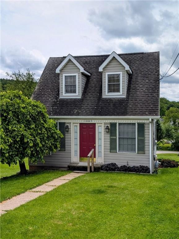 1003-1007 Youngstown Ridge Rd, Unity Twp, PA 15696 - new england style home featuring a front lawn and roof with shingles