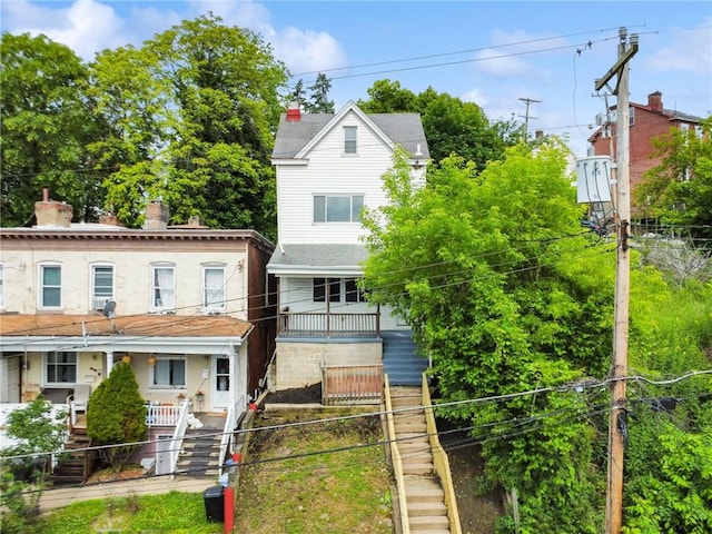 32 Norton St, Mt Washington, PA 15211 - view of front of property featuring stairway, covered porch, and a chimney