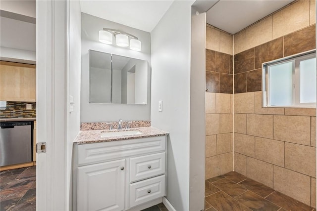 32 Norton St, Mt Washington, PA 15211 - bathroom with vanity, tiled shower, and backsplash