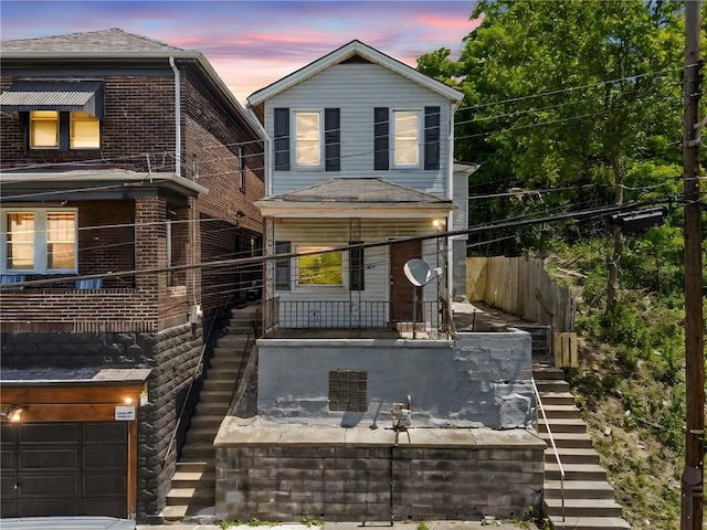 427 Price N, Braddock, PA 15104 - traditional home with stairway and an attached garage