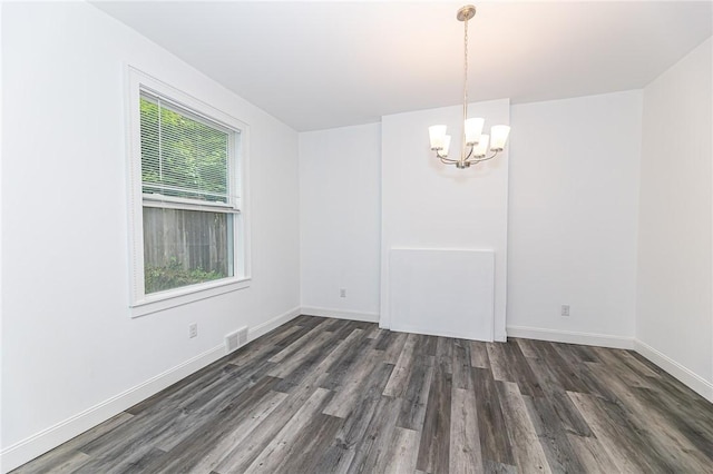 1044 Flemington St, Greenfield, PA 15217 - unfurnished room with a chandelier, wood finished floors, and baseboards