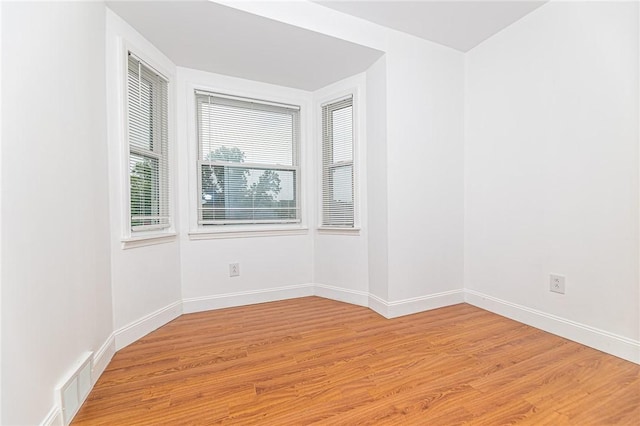 1044 Flemington St, Greenfield, PA 15217 - unfurnished room with light wood finished floors and baseboards