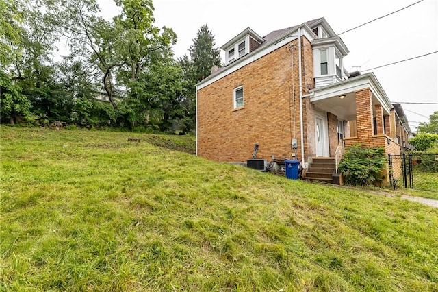 1044 Flemington St, Greenfield, PA 15217 - view of side of property featuring brick siding and central AC