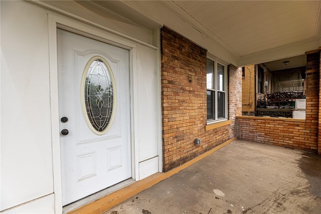 1044 Flemington St, Greenfield, PA 15217 - doorway to property with a porch and brick siding