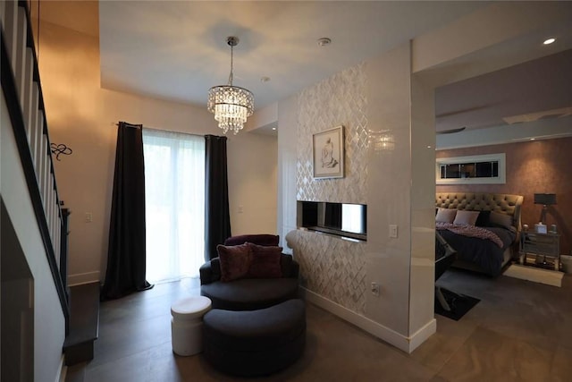 267 Reibold Rd, Forward Twp But, PA 16053 - living area with a chandelier, baseboards, and a fireplace