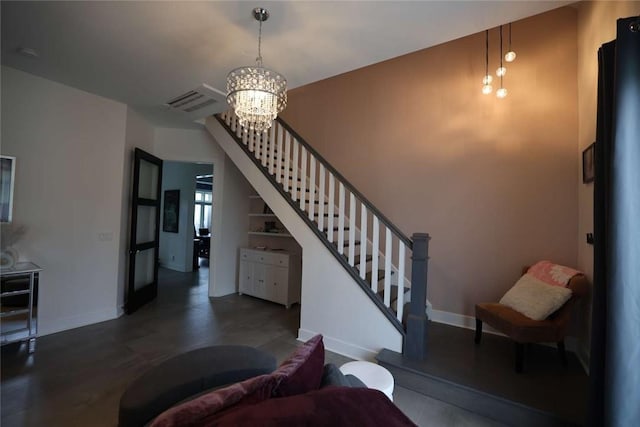 267 Reibold Rd, Forward Twp But, PA 16053 - staircase with a chandelier and baseboards