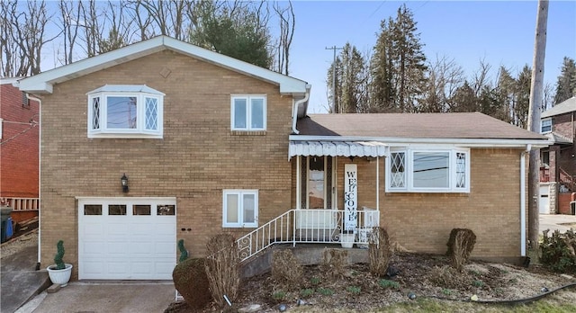 638 Friday Rd, Shaler, PA 15209 - tri-level home with a garage, brick siding, and driveway