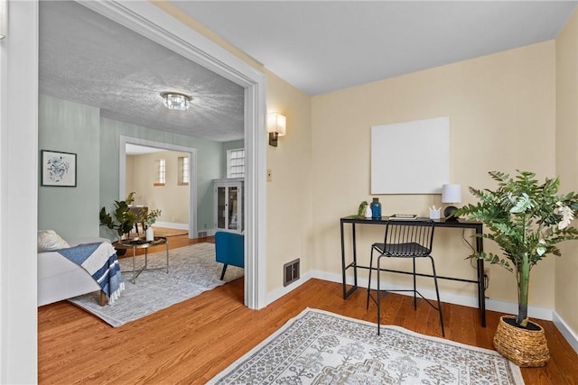907 Greenfield Ave, Greenfield, PA 15217 - sitting room with wood finished floors and baseboards